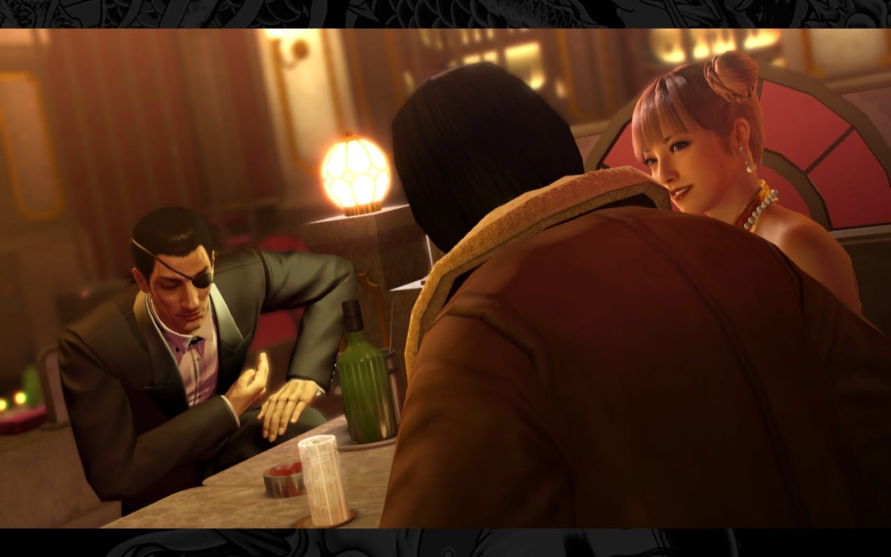 A screenshot from Yakuza 0 depicting a Club Sunshine client seated at a table, facing away from the viewer. Next to him is a hostess, and across from him is Majima, who is bowing to him